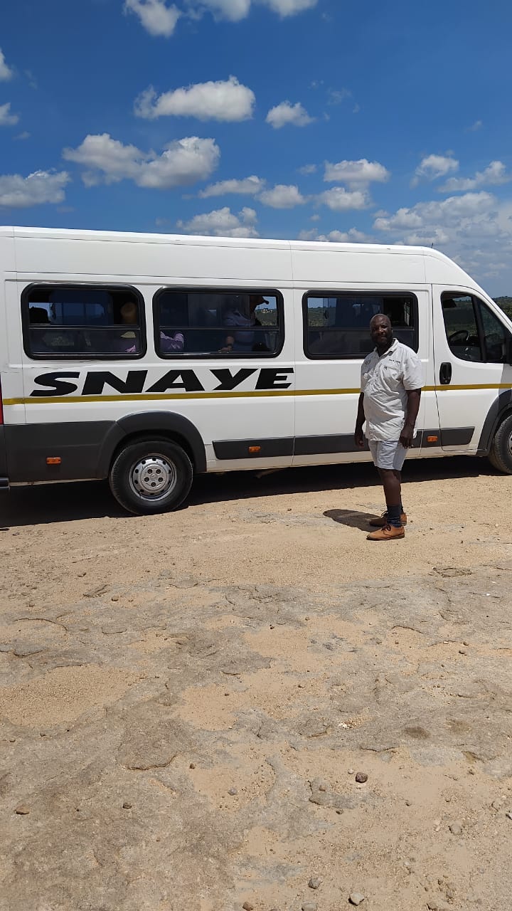 Snaye branded tour vehicle on location